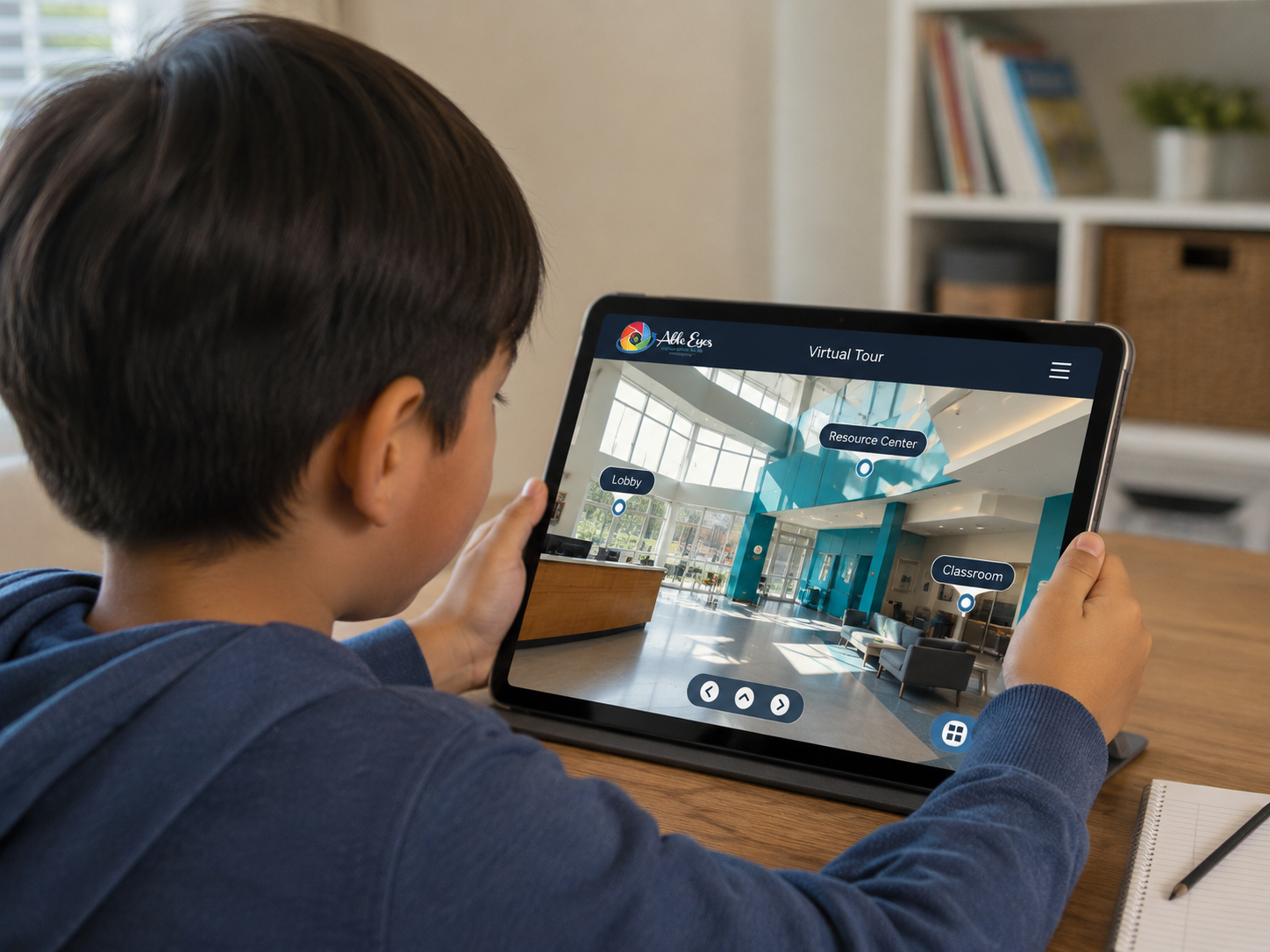 A young person exploring an Able Eyes virtual tour of a community space on a tablet.
